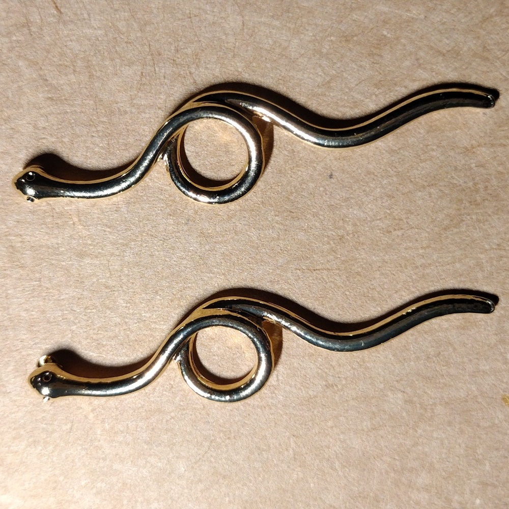 Gold plated, snake shaped , stud earrings.